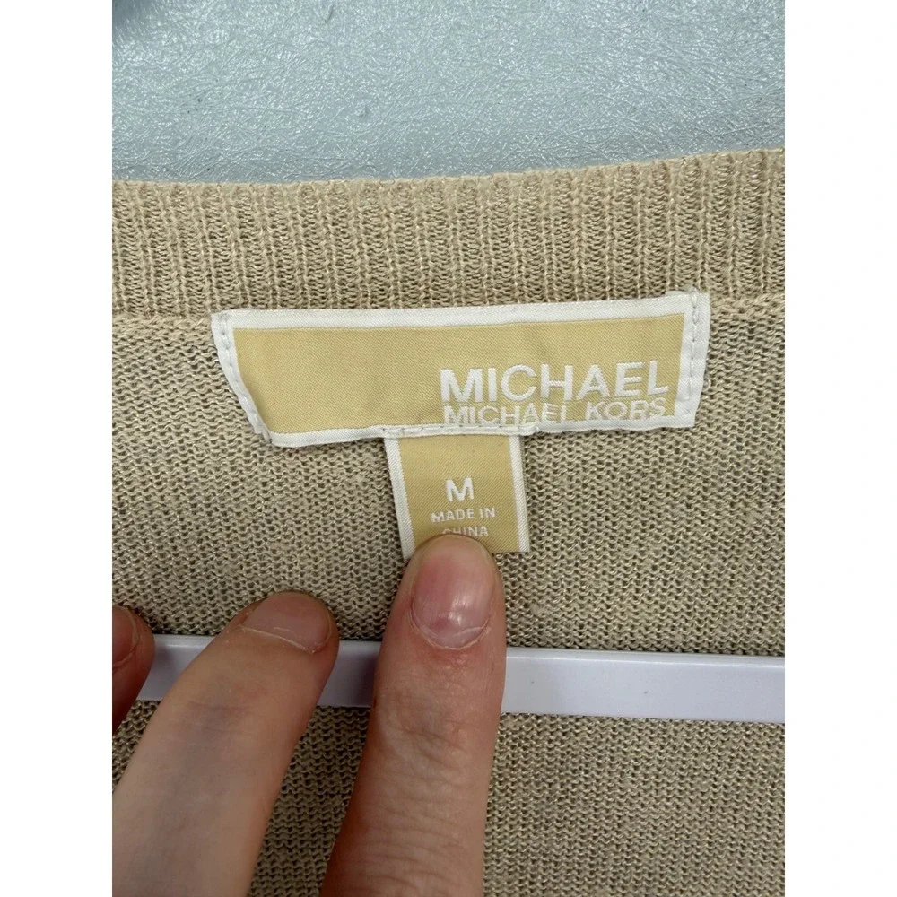 Michael Kors size season quiet
